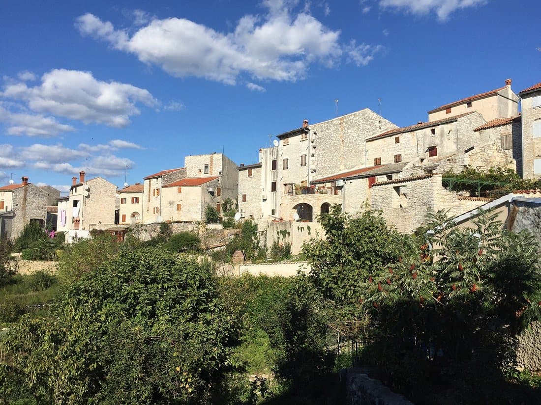 Bale medieval village on a low hill in western Istria, Croatia, with stone buildings and a Venetian castle