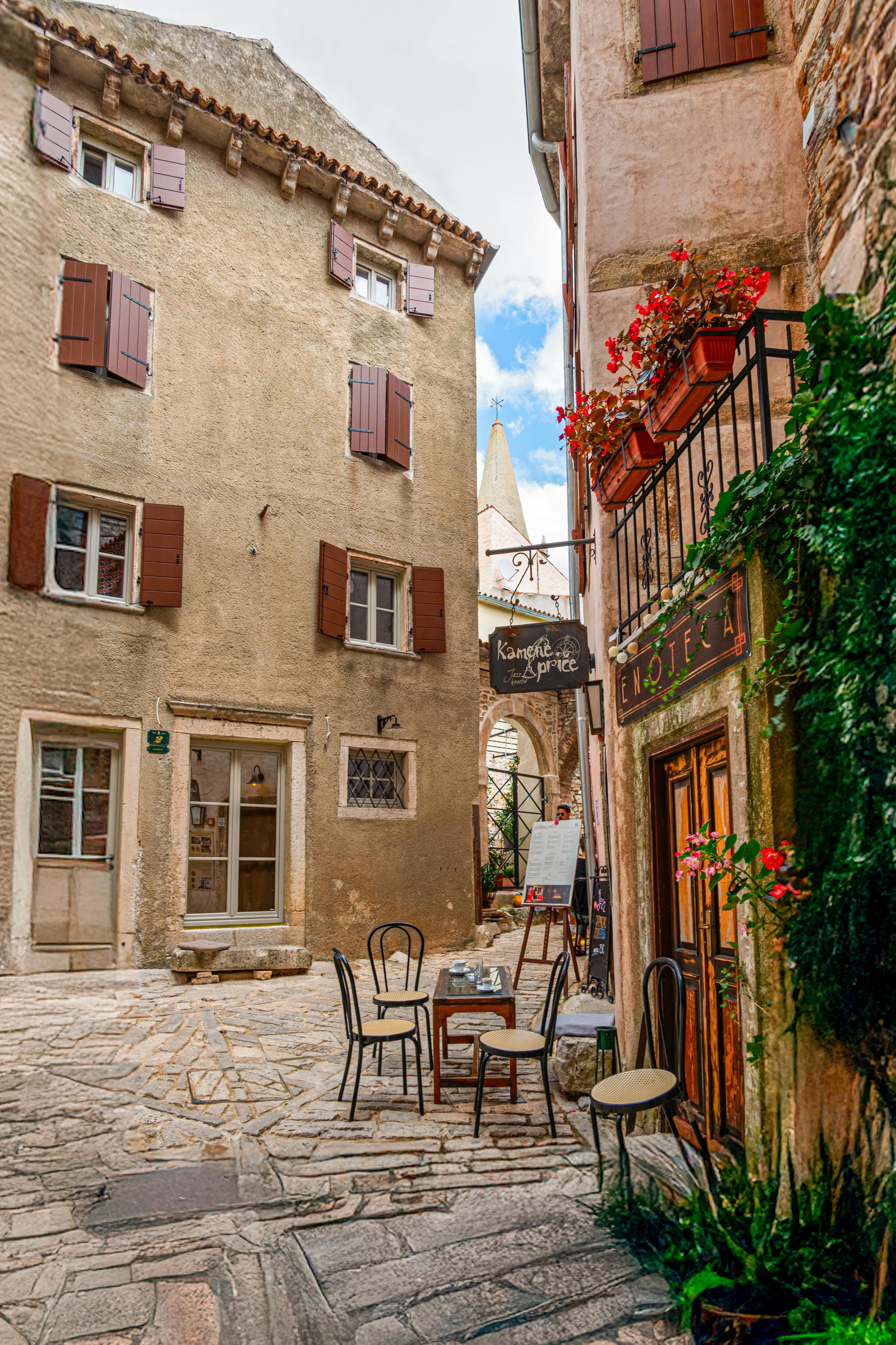 Narrow medieval stone street in the village of Bale, western Istria