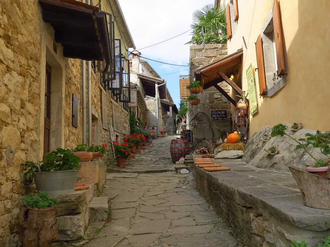 The ancient stone gate and walls of Hum, the world's smallest town, in Istria