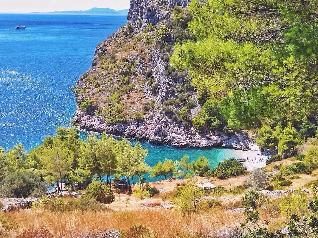 Zarace beach on Hvar's southern coast with dramatic cliffs