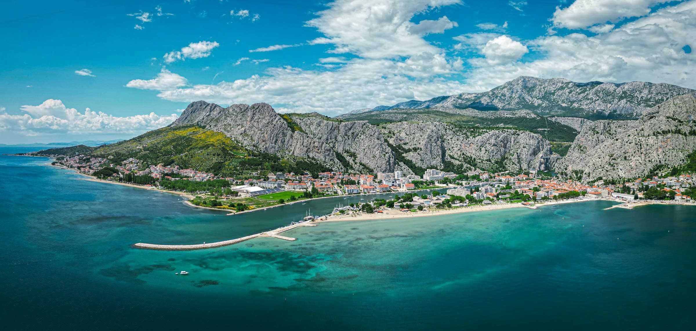 Omiš nestled between cliffs and the Cetina River mouth on the Dalmatian coast