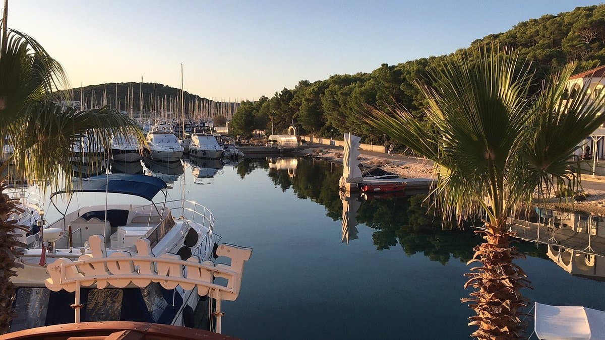 Rogoznica marina with yachts and Dalmatian coastline