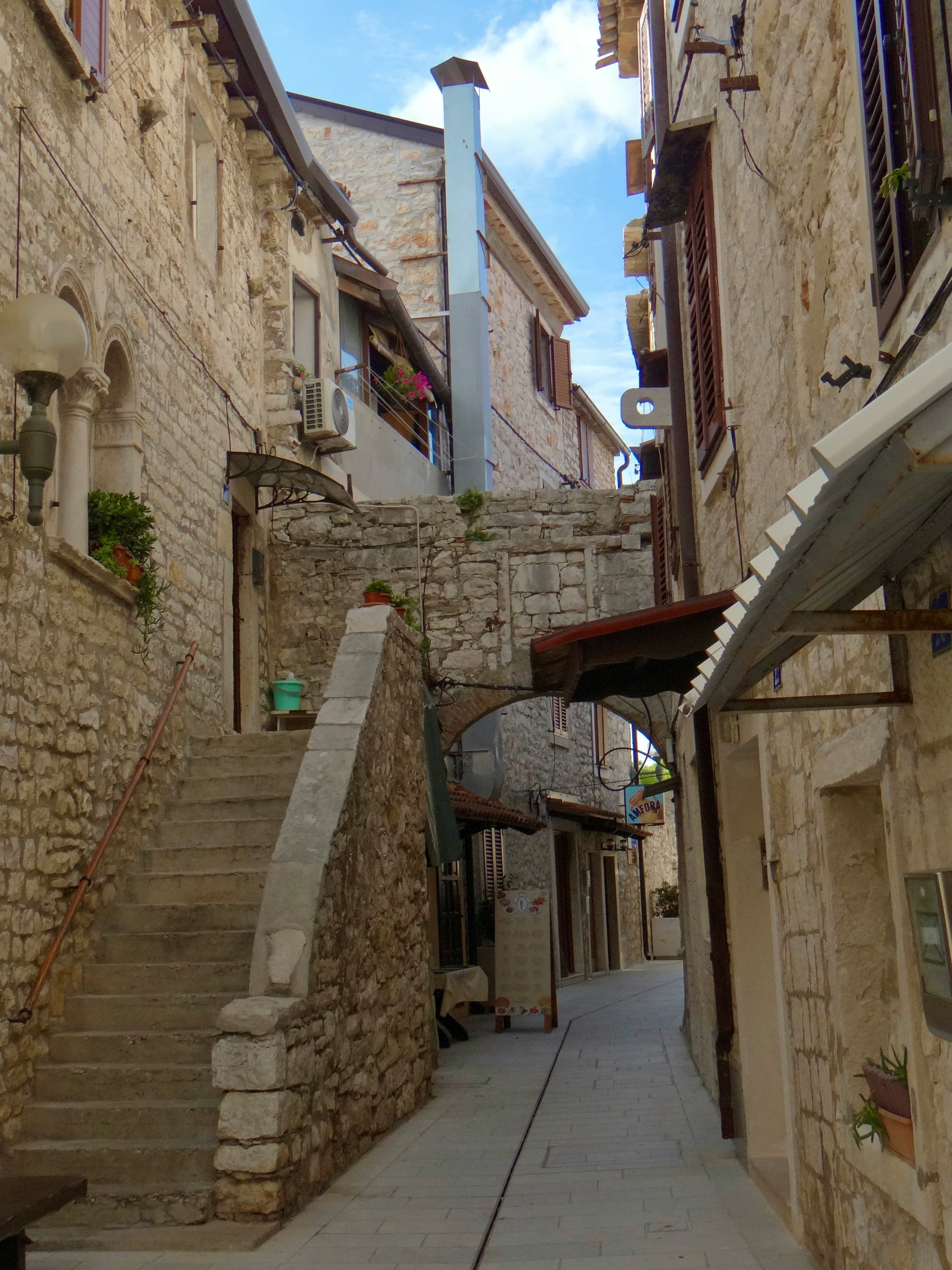 Narrow stone street in Umag old town