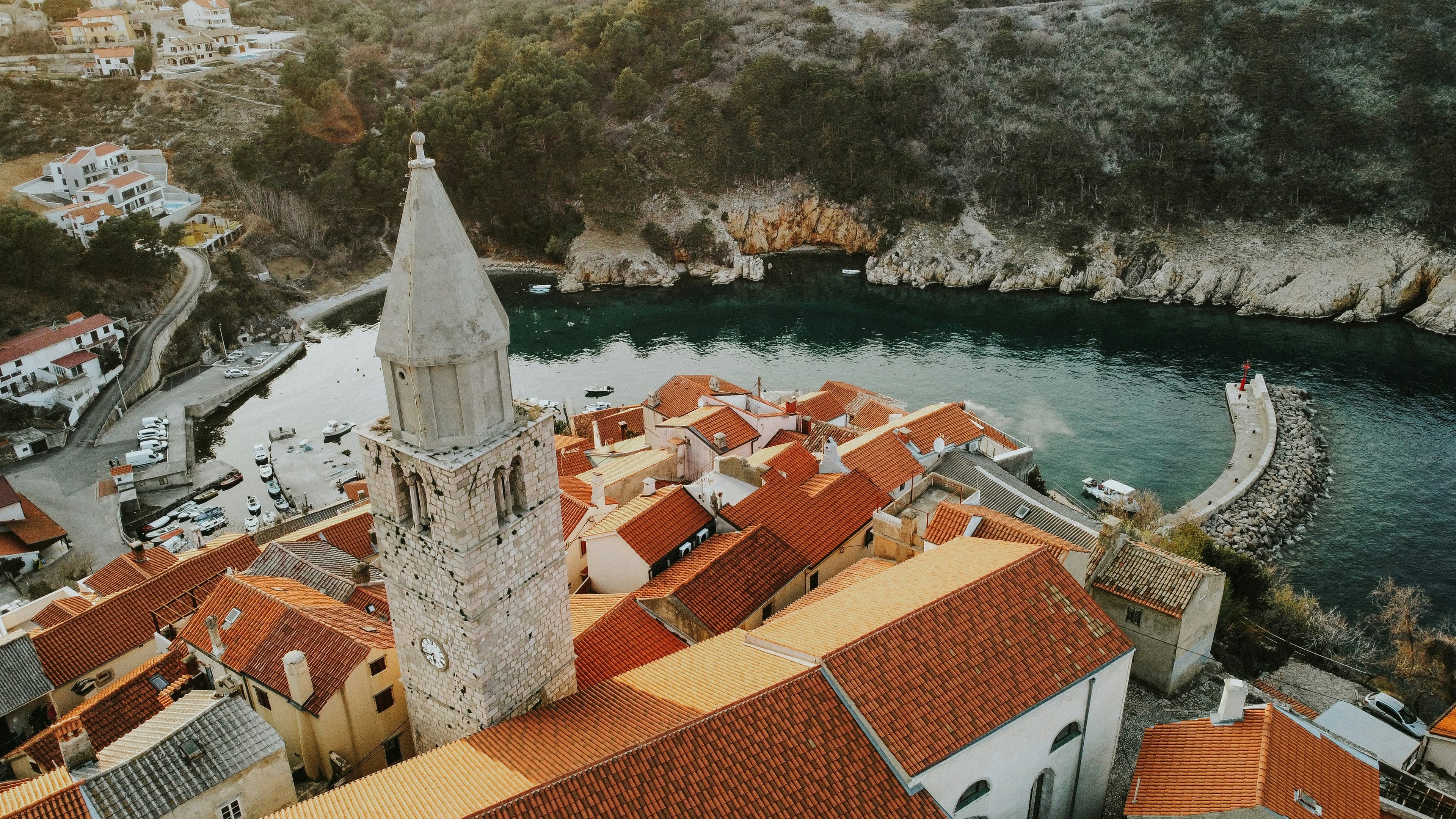 Vrbnik bay and harbour viewed from the clifftop village of Vrbnik, Krk island