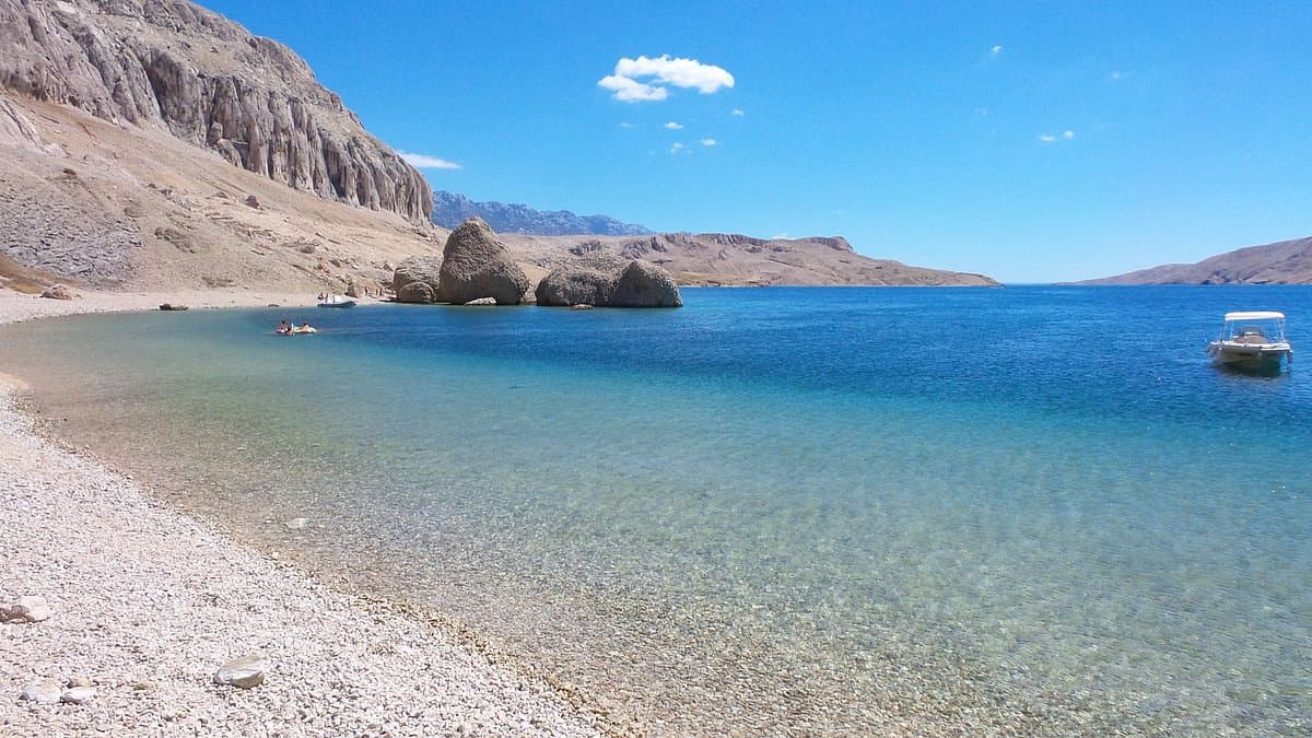 Beriknica beach on the island of Pag with natural rock formations and turquoise Adriatic water
