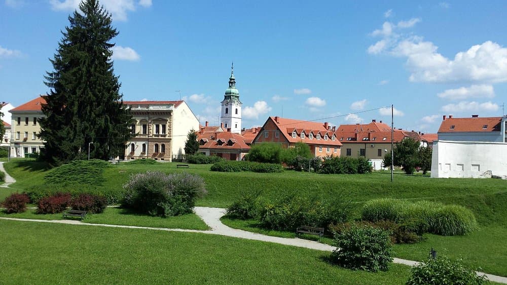 Green park and promenade following the outline of Karlovac's historic star fortifications