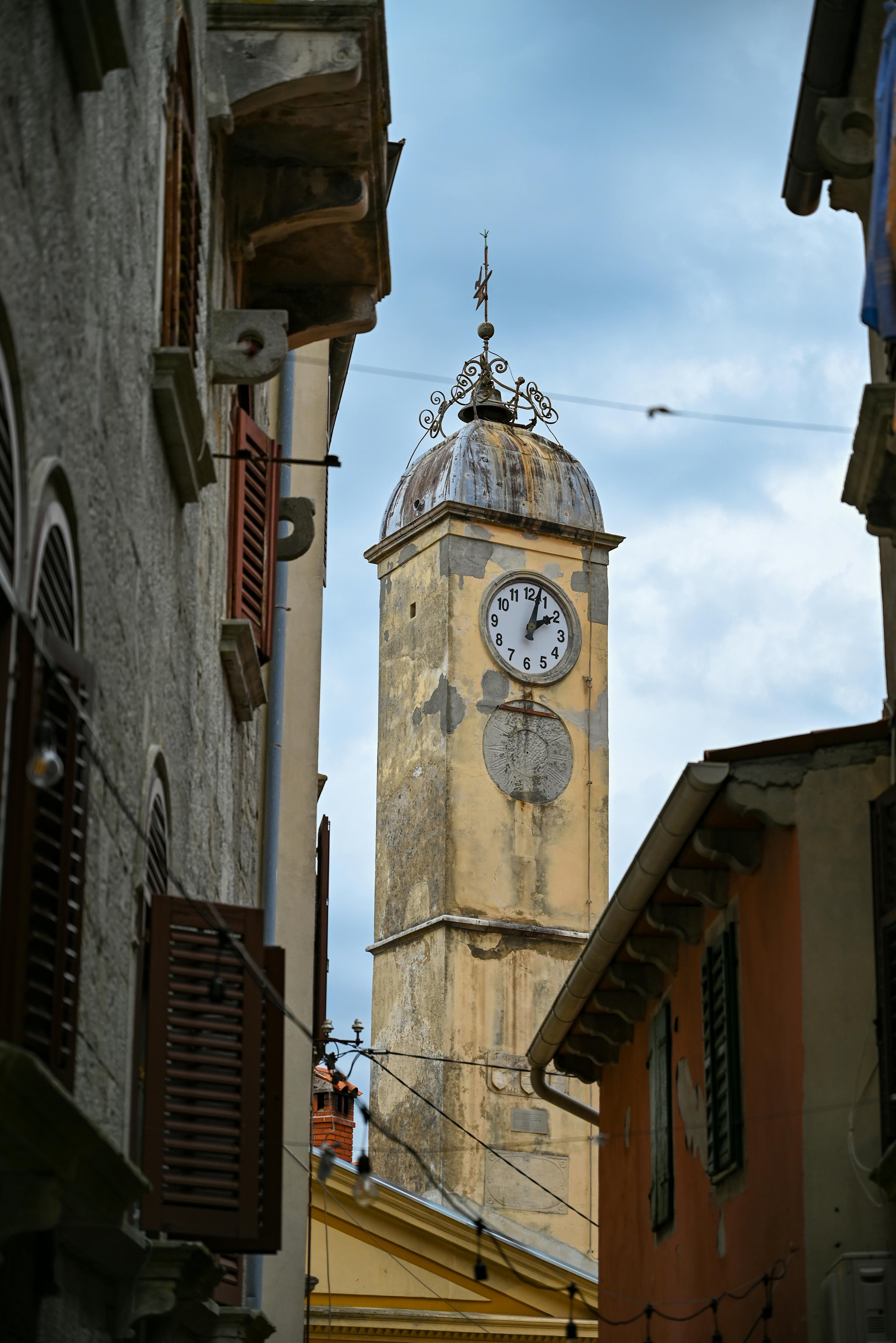 Bell tower and church facade in the hilltop old town of Labin, eastern Istria