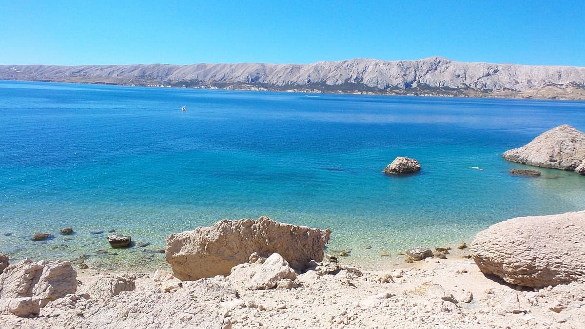 The Life on Mars Trail on the island of Pag, Croatia — white karst rocks and deep blue Adriatic sea