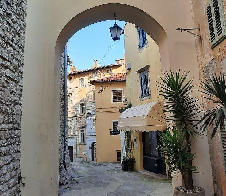 Narrow medieval street in Lovran's Stari Grad, Kvarner