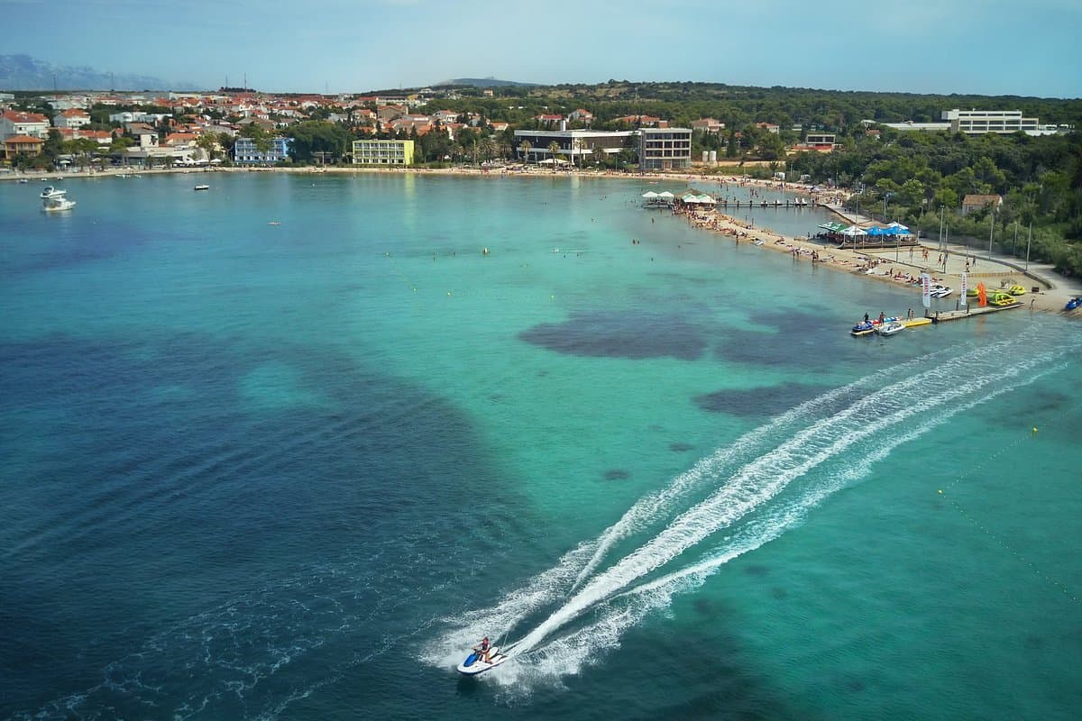 The town of Novalja on the island of Pag, Croatia, with its harbour and clear Adriatic water