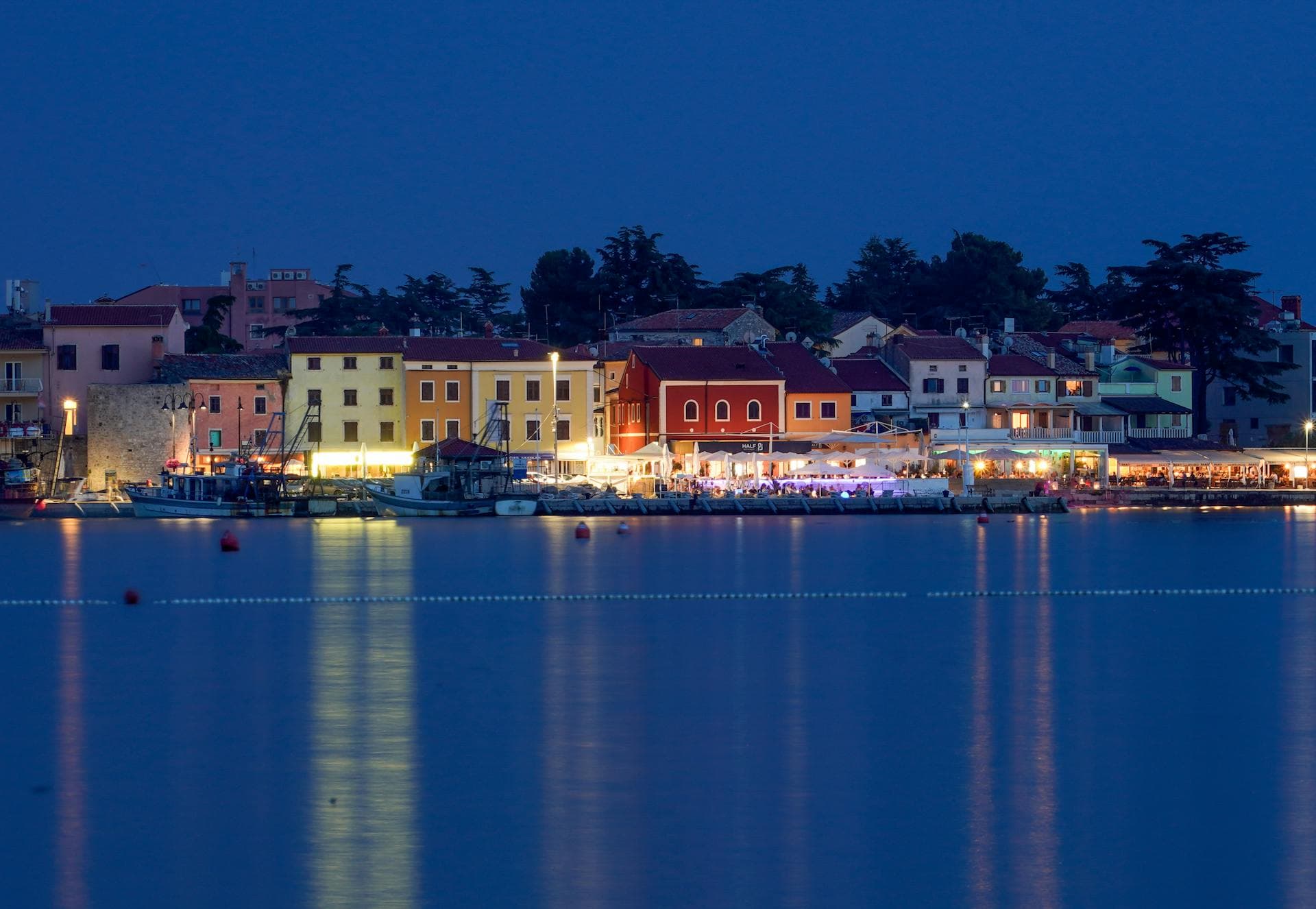 Novigrad marina and waterfront illuminated at night