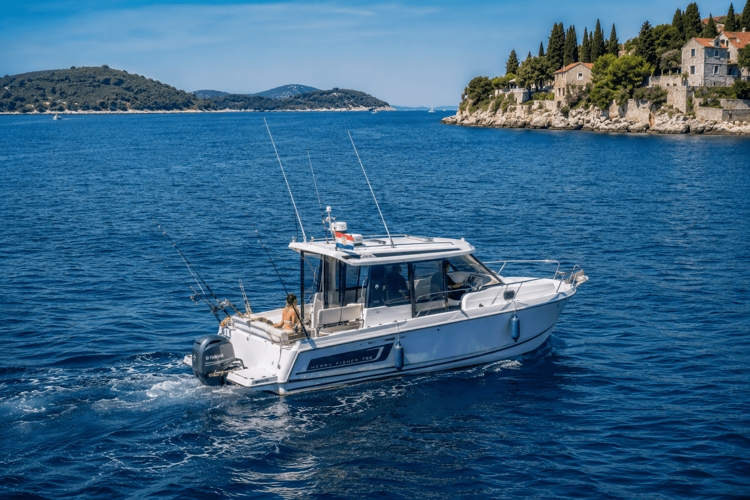 Charter fishing boat on the Adriatic south of Dubrovnik — Elafiti islands in the background