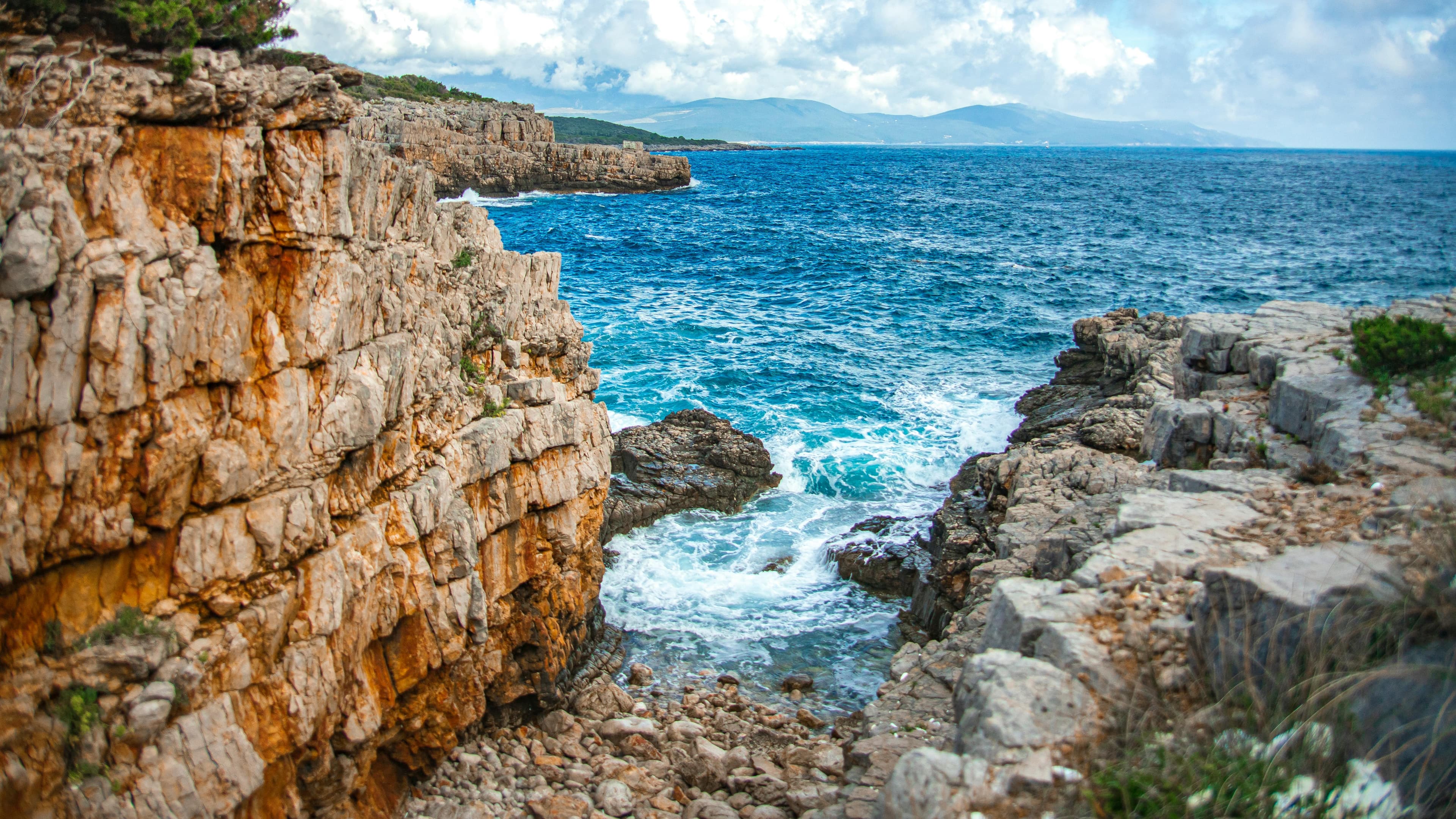 Sea cliff climbing routes on Hvar and Brač — limestone walls above the Adriatic